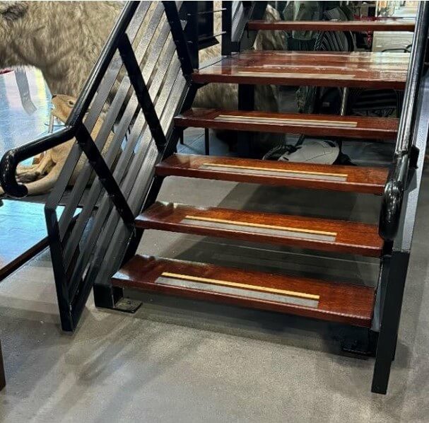 Photograph of internal stairs with no tactile markers