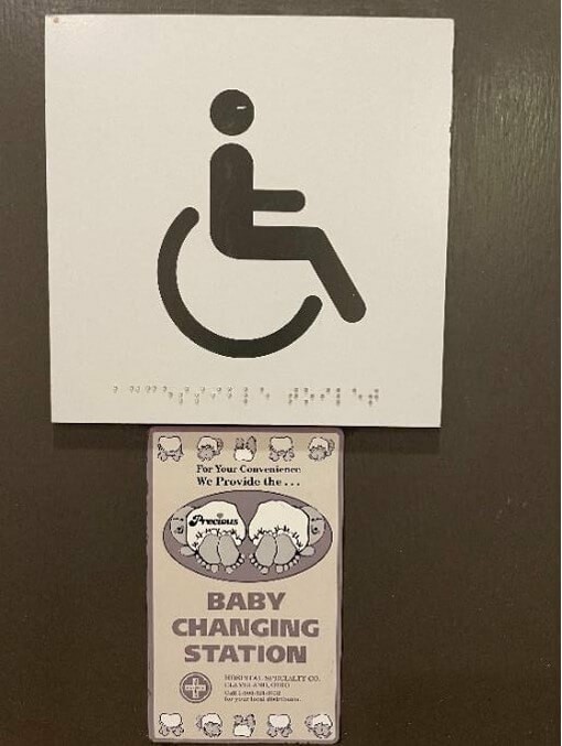 Photograph of disabled toilet sign with Braille  