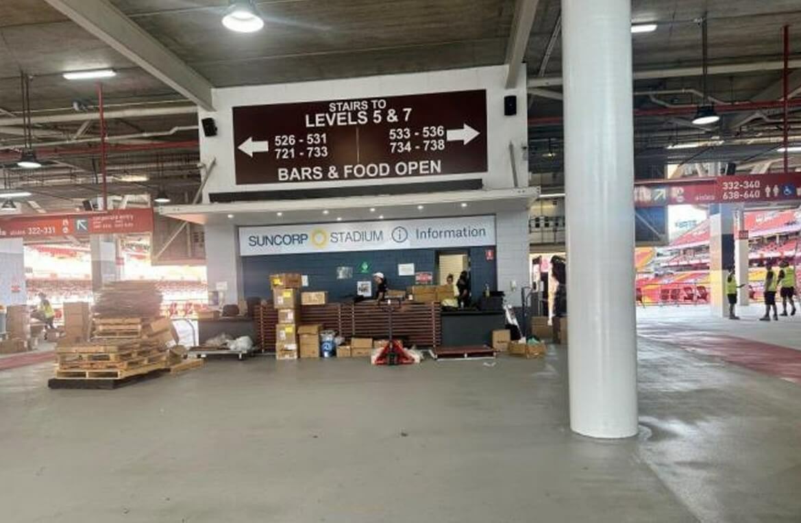 Photograph of Congregation area&nbsp;showing there is no tactile (inc. Braille) signage and pole in heavy traffic area has no colour contrast. NB Image not taken on an event day.