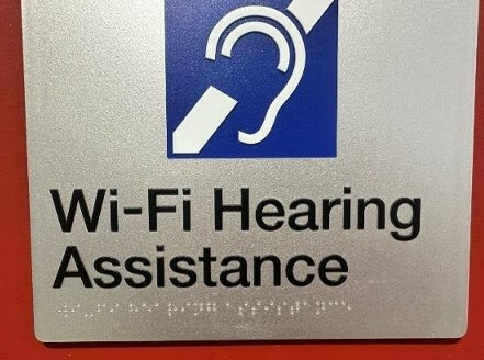 Photograph of tactile Braille embossing on signage