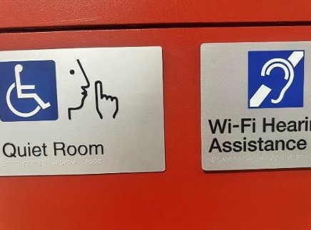 Photo of signage with braille